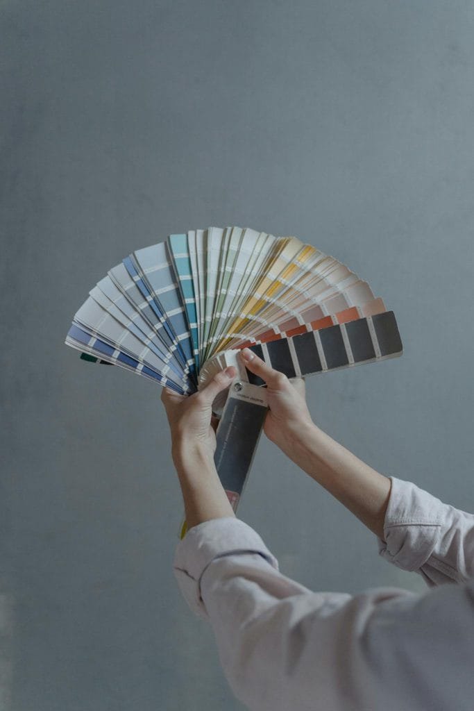 Home 1 Utah Home Renovation, Person Holding Blue White And Red Hand Fan